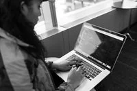 Adult learner engaged in programming