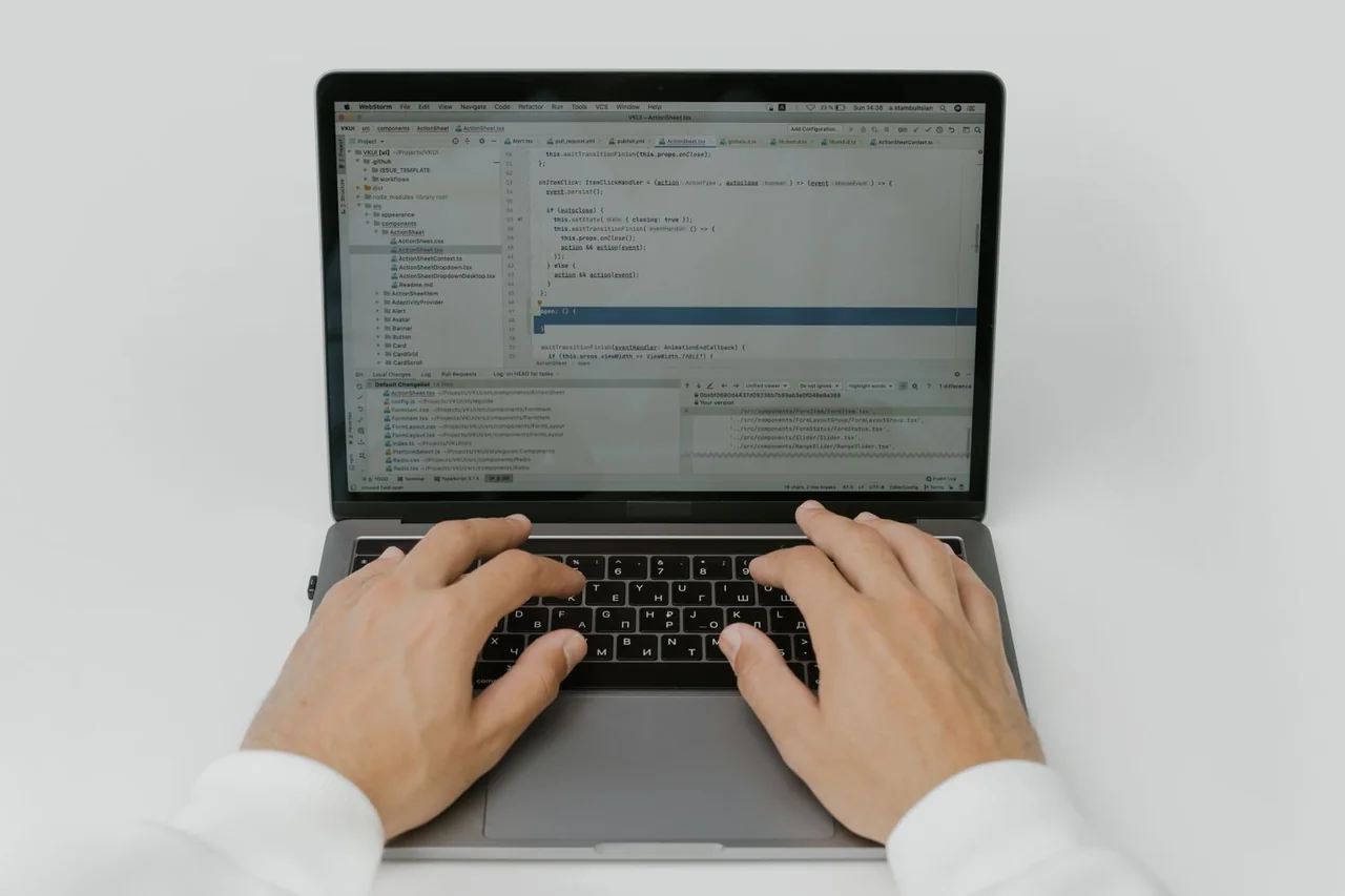 Programmer typing Python syntax for an inventory calculation tool